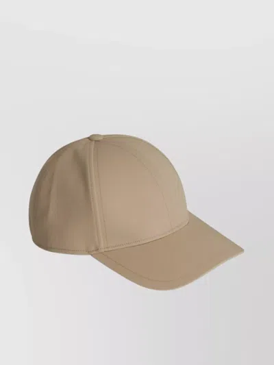 Sacai Cotton Cap With Curved Brim And Panelled Design In Beige