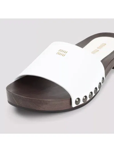 Miu Miu Wood Sole Flat Sandals With Studded Side In White