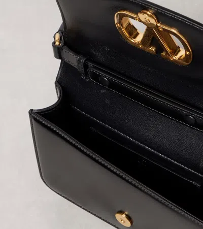 Valentino Garavani Vain Small Vlogo Leather Clutch Bag In Black