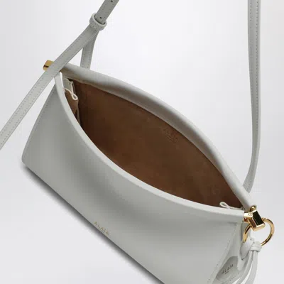 Shop Alaïa Le Click East West Small White Bag