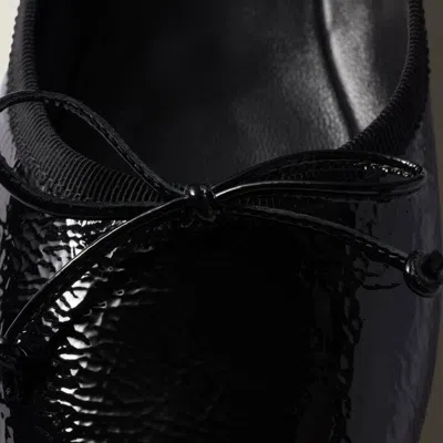 Miu Miu Logo-printed Bow Detailed Ballerina Shoes In Animal Print