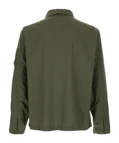 C.p. Company Green Jacket With Classic Collar And Logo Patch On The Sleeve In Green