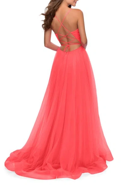La Femme Long Tulle A-line Gown With Side Slit And Pockets In Hot Coral