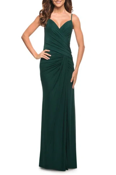 La Femme Net Jersey Long Ruched Gown With Slit And Open Back In Emerald