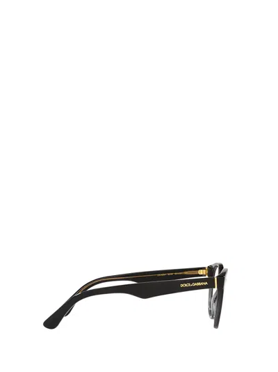 Dolce & Gabbana Round Frame Glasses In 3246 Black/transparent Grey