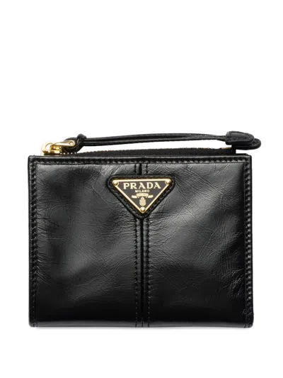 Prada Textured Leather Zip Wallet In Black