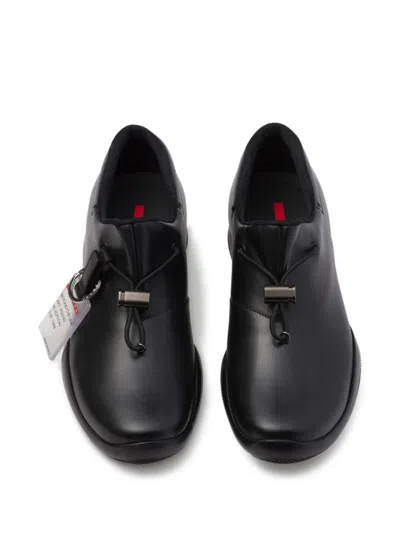 Prada Toblach Leather Sneakers In Black