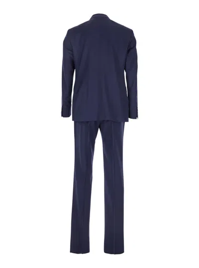 Tagliatore Blue Single-breasted Suit With Notched Revers And Brooch Detail On The Front In Wool Man In Blue