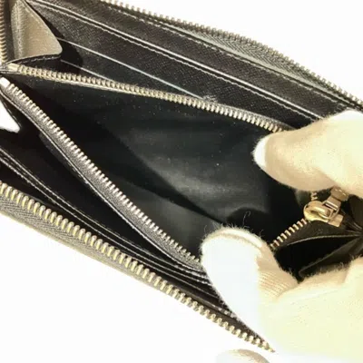Pre-owned Louis Vuitton Black Noir Epi Leather Long Wallet (bi-fold) () In Black, Noir