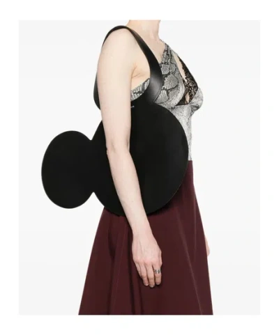 Coperni Mickey Black Handbag With Cut-out Handle And Logo Lettering On The Front In Leather
