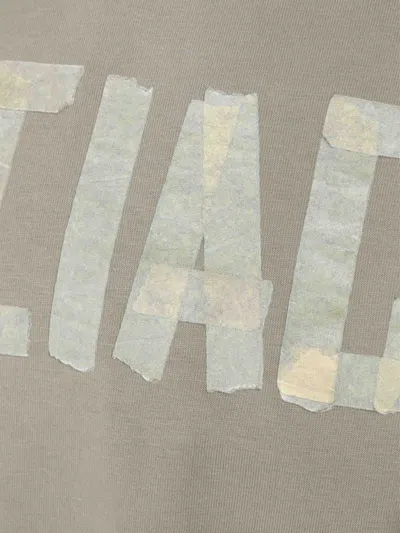 Balenciaga Crew Neck Distressed Neckline Graphic Print In Military Green