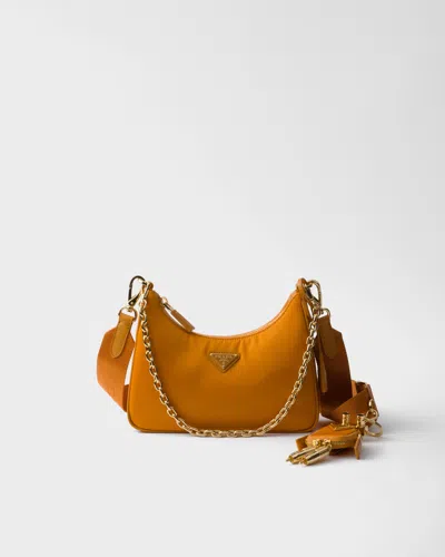 Prada Re-edition 2005 Re-nylon And Saffiano Leather Bag With Charm In Amber
