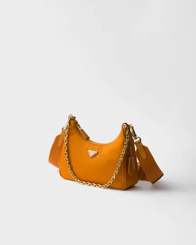 Prada Re-edition 2005 Re-nylon And Saffiano Leather Bag With Charm In Amber