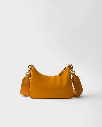 Prada Re-edition 2005 Re-nylon And Saffiano Leather Bag With Charm In Amber