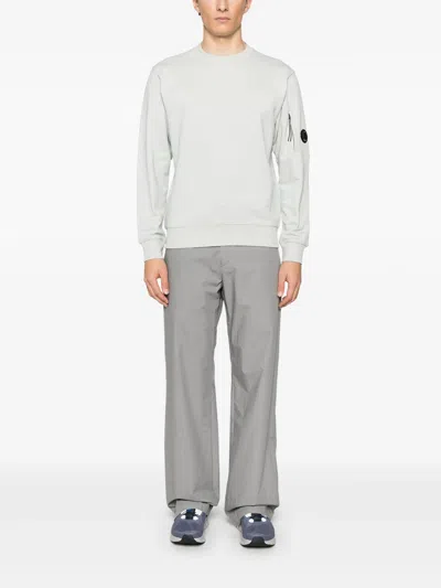 C.p. Company Logo Crew Neck Sweatshirt With Sleeve Zip Pocket