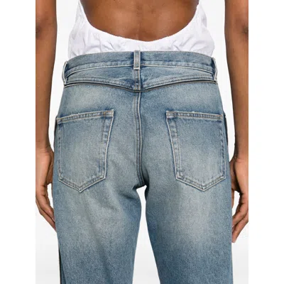 Moschino Ruffled Overlay Distressed Jeans