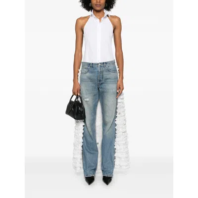 Moschino Ruffled Overlay Distressed Jeans