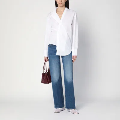 Mother The Mid Rise Maven Sneak Jeans In Washed Blue In Blue