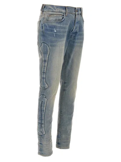 Amiri '3d Bones' Light Blue Jeans With 3d Detail On The Side And Logo Lettering On The Rear In Blue