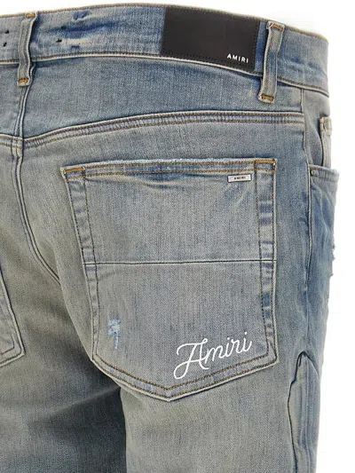 Amiri '3d Bones' Light Blue Jeans With 3d Detail On The Side And Logo Lettering On The Rear In Blue