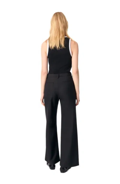 Maje Flared Tailored Trousers In Black