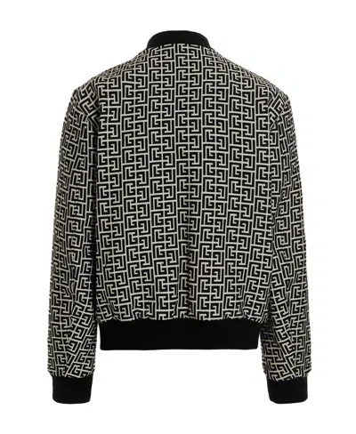 Balmain Monogram-pattern Reversible Bomber Jacket In Black White