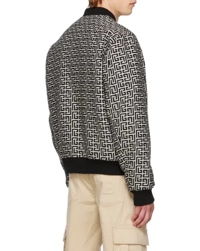 Balmain Monogram-pattern Reversible Bomber Jacket In Black White