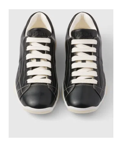 Prada Handcrafted Leather Sneakers Geometric Stitching In Black