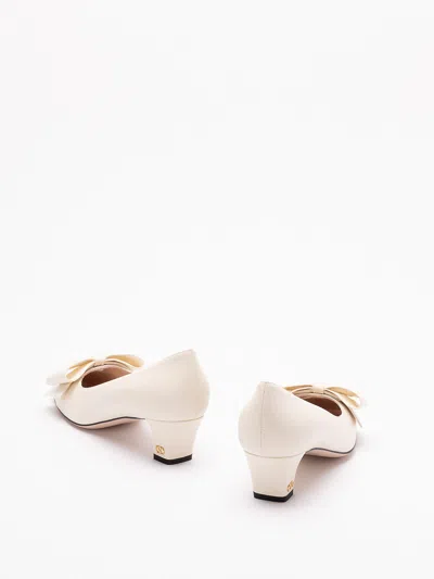 Valentino Garavani Bowow Pumps In Yellow