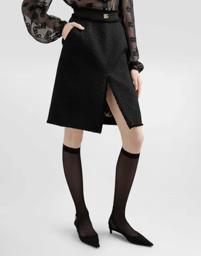 Dolce & Gabbana Raschel Tweed Midi Skirt With Central Slit And Dg Logo In Black