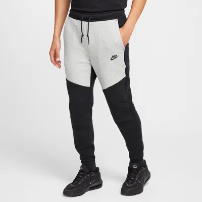 Nike Slim-fit Tapered Logo-print Cotton-blend Tech Fleece Sweatpants In Black