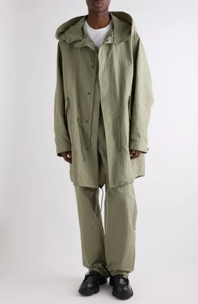 Givenchy Monogram 72 Embossed Fishtail Parka With Removable Hood In Almond Green