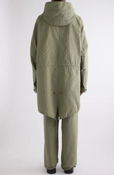 Givenchy Monogram 72 Embossed Fishtail Parka With Removable Hood In Almond Green