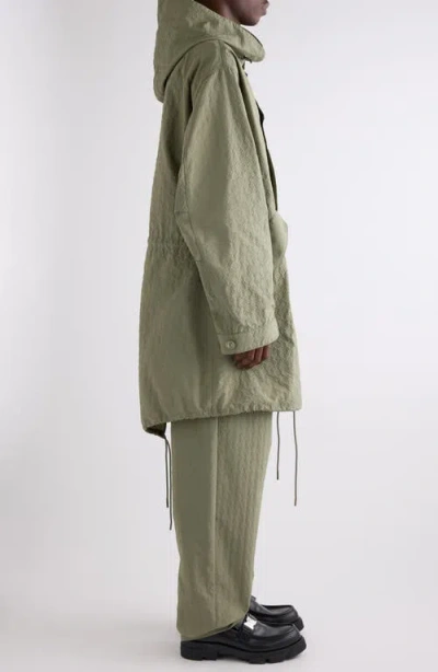 Givenchy Monogram 72 Embossed Fishtail Parka With Removable Hood In Almond Green