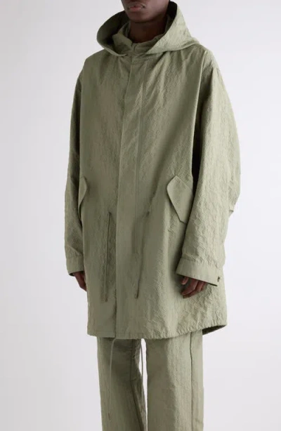 Givenchy Monogram 72 Embossed Fishtail Parka With Removable Hood In Almond Green