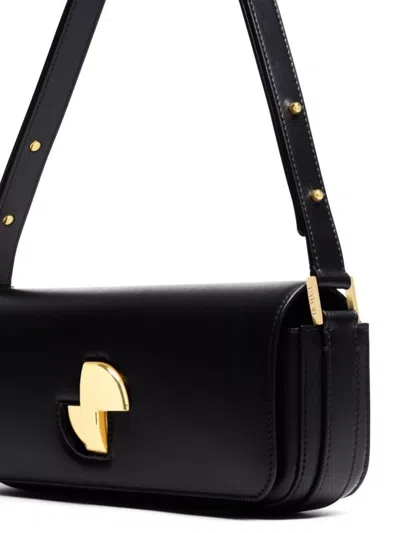 Patou Shoulder Bag With Structured Silhouette And Adjustable Strap
