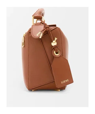 Loewe Small Leather Featherlight Puzzle Top-handle Bag In Brown