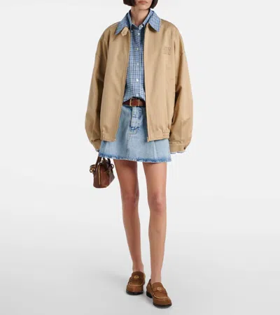 Frame Pleated Denim Mini Skirt In Outlaw In Blue