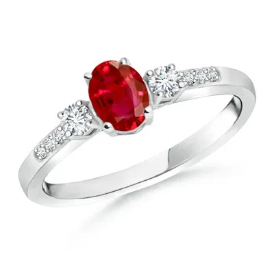 Angara Classic Oval Ruby And Round Diamond Three Stone Engagement Ring In White Gold/medium Red