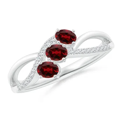 Angara Oval Garnet Three Stone Bypass Ring With Diamonds In White Gold/rich Red