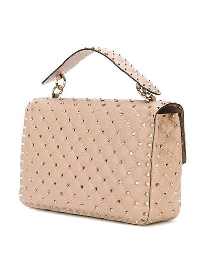 Shop Valentino Garavani Rockstud Spike Shoulder Bag In Neutrals