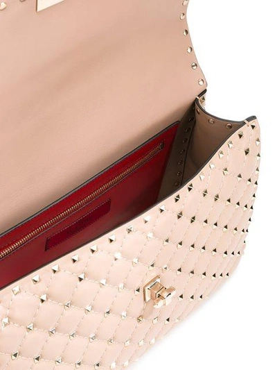 Shop Valentino Garavani Rockstud Spike Shoulder Bag In Neutrals