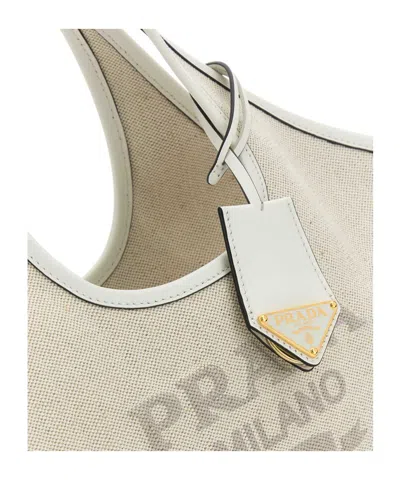 Prada Canvas Top Handle Shoulder Bag In Tan / White