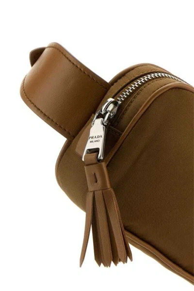 Prada Biscuit Re-nylon Belt Bag With Tassel Detail In Brown