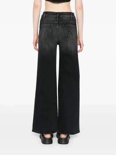 Mother The Roller Sneak Flared Jeans In Black