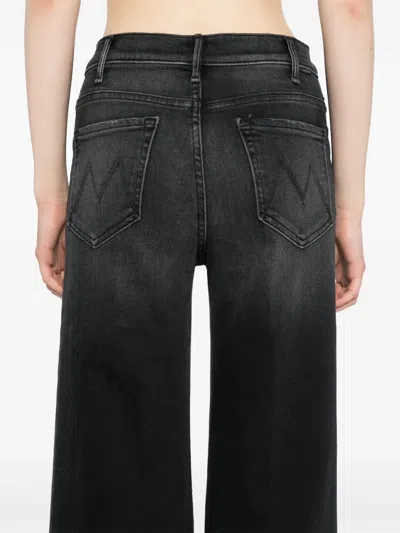 Mother The Roller Sneak Flared Jeans In Black