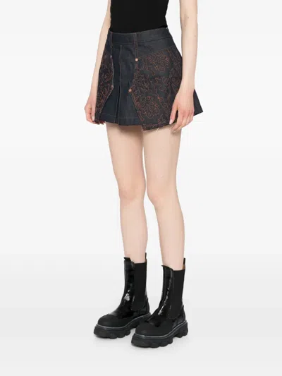 刺绣拼接百褶牛仔半身裙