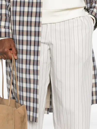 The Row Hypnosta Trousers In White With Stripes In White