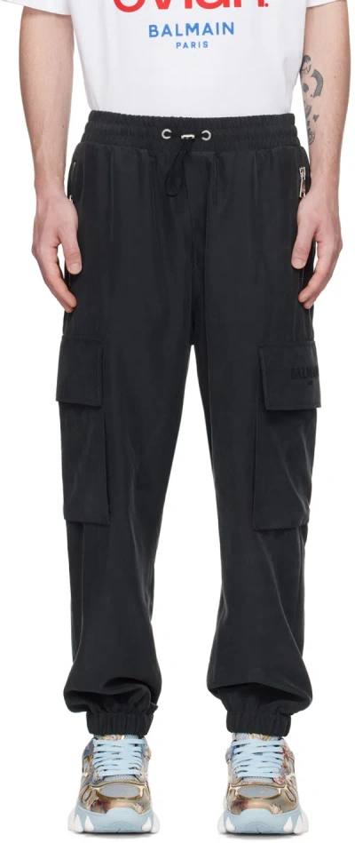 Balmain Embossed-logo Modal-blend Cargo Pants In Black
