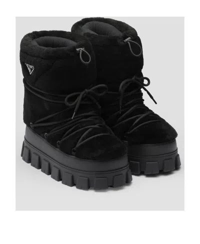Prada Shearling And Rubber Ankle Boots With Fur Texture In Black